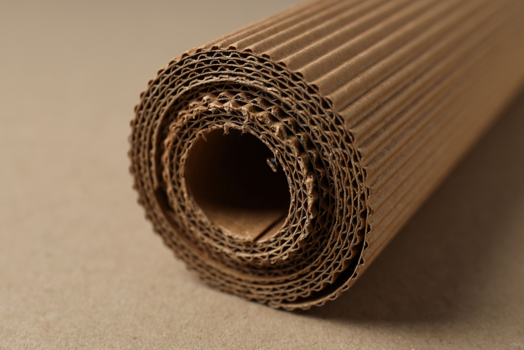 corrugated-cardboard-is-laid-out-rolls-table.jpg